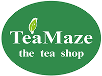 Green oval logo with the text "TeaMaze" and "the tea shop" in white, complemented by a small leaf design above the "M". Discover the perfect brew blend while enjoying seamless browsing experiences, thanks to our top-notch WordPress Website Maintenance.